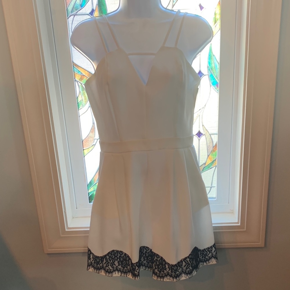 Jealous Tomato White spaghetti strap romper  with Black Lace Accents